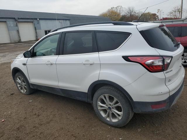 Photo 2 from auction – 2018 FORD ESCAPE SE with VIN 1FMCU9GD7JUC43034