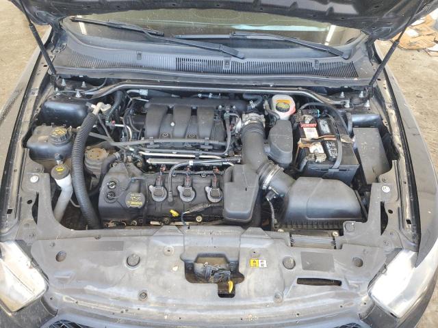 Photo 11 from auction – 2014 FORD TAURUS POL with VIN 1FAHP2MK7EG124163