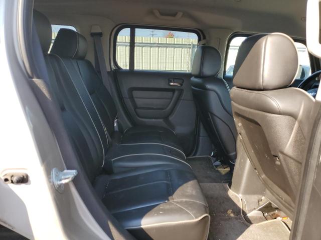 Photo 10 from auction – 2006 HUMMER H3 with VIN 5GTDN136168118571