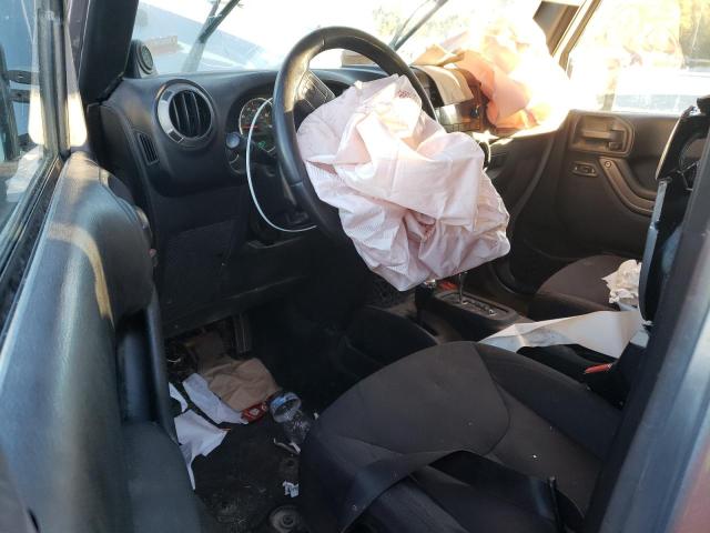 Photo 8 from auction – 2014 JEEP WRANGLER U with VIN 1C4BJWDG4EL316345