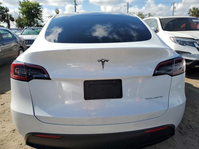 Photo 6 from auction – 2023 TESLA MODEL Y with VIN 7SAYGAEE7PF780103