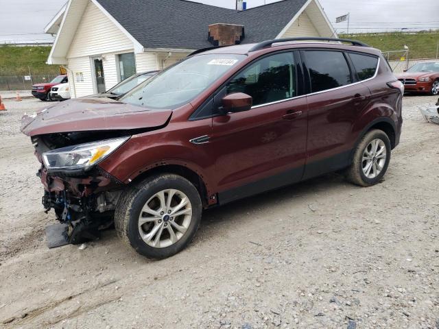 FORD ESCAPE SE 2018 with VIN 1FMCU9GD0JUC29752 - Photo from auction
