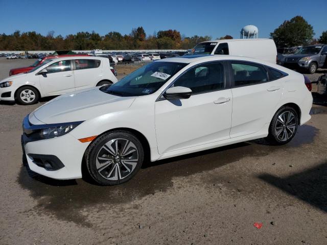 Photo 1 from auction – 2017 HONDA CIVIC EXL with VIN 2HGFC1F7XHH651561