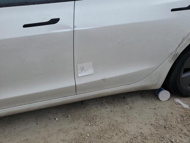 Photo 12 from auction – 2023 TESLA MODEL 3 with VIN 5YJ3E1EA8PF590059