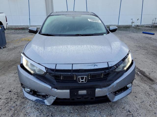 Photo 5 from auction – 2016 HONDA CIVIC EX with VIN 2HGFC1F35GH647736