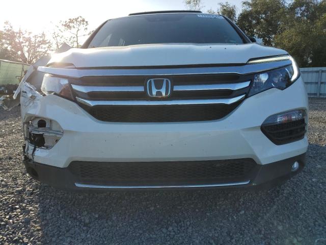 Photo 5 from auction – 2017 HONDA PILOT ELIT with VIN 5FNYF6H07HB056930