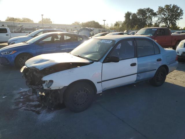 TOYOTA COROLLA LE 1993 with VIN 1NXAE09E3PZ058459 - Photo from auction