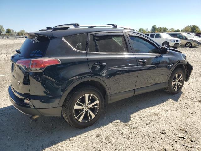 Photo 3 from auction – 2017 TOYOTA RAV4 XLE with VIN 2T3RFREV6HW673073