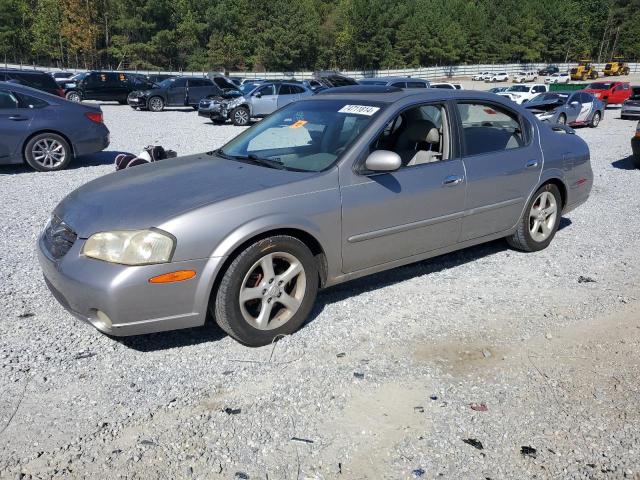 NISSAN MAXIMA GLE 2000 with VIN JN1CA31D1YT762991 - Photo from auction