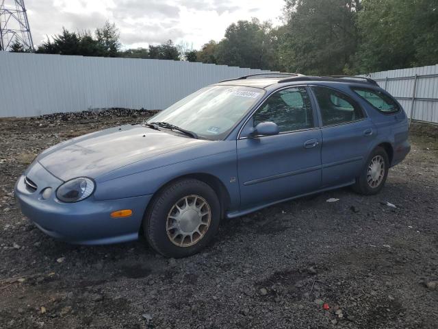FORD TAURUS SE 1999 with VIN 1FAFP58S2XA261374 - Photo from auction