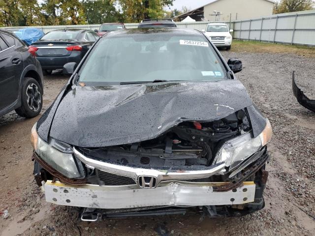 Photo 5 from auction – 2012 HONDA CIVIC LX with VIN 2HGFB2F51CH611093