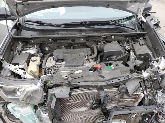 Photo 11 from auction – 2018 TOYOTA RAV4 LE with VIN JTMZFREV9JJ179035