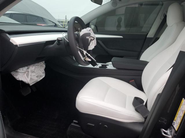Photo 7 from auction – 2023 TESLA MODEL Y with VIN 7SAYGDEE0PF863017