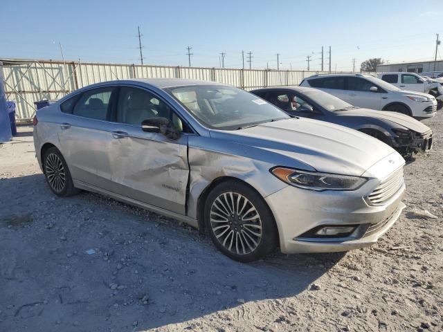 Photo 4 from auction – 2017 FORD FUSION TIT with VIN 3FA6P0RU9HR323038