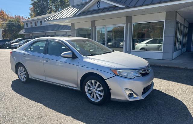 TOYOTA CAMRY HYBR 2014 with VIN 4T1BD1FK4EU135232 - Photo from auction