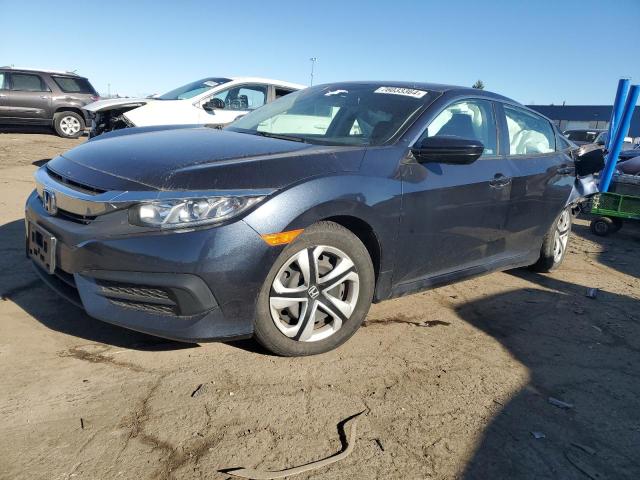 Photo 1 from auction – 2018 HONDA CIVIC LX with VIN 2HGFC2F50JH579487