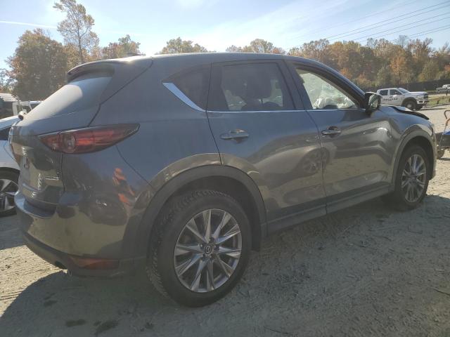 Photo 3 from auction – 2021 MAZDA CX-5 GRAND with VIN JM3KFBDM8M0309907