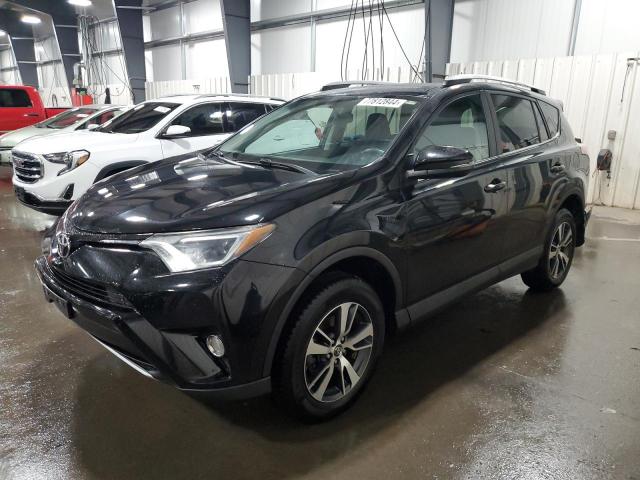 TOYOTA RAV4 XLE 2016 with VIN 2T3RFREV8GW504462 - Photo from auction