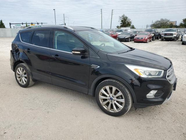 Photo 4 from auction – 2017 FORD ESCAPE TIT with VIN 1FMCU0JD0HUB05933