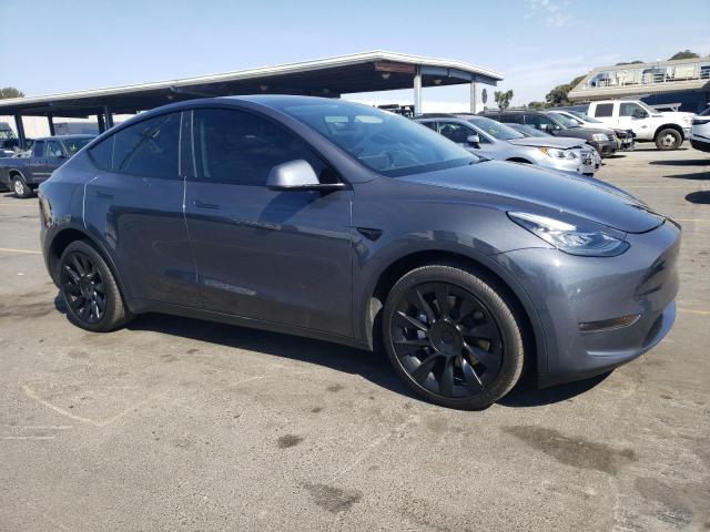 Photo 4 from auction – 2023 TESLA MODEL Y with VIN 7SAYGDEE3PA045200