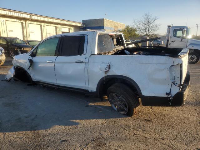 Photo 2 from auction – 2022 HONDA RIDGELINE with VIN 5FPYK3F74NB028905