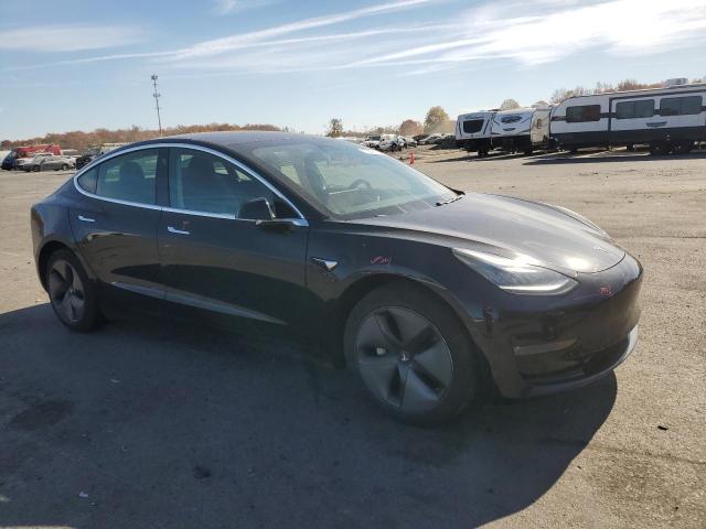 Photo 4 from auction – 2019 TESLA MODEL 3 with VIN 5YJ3E1EA1KF397812