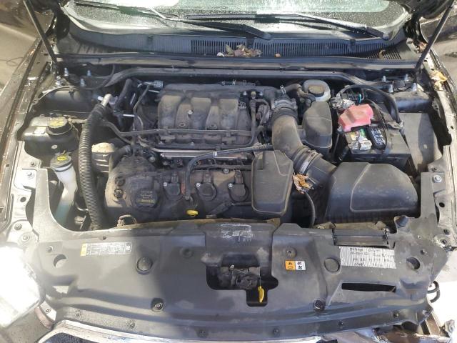 Photo 11 from auction – 2014 FORD TAURUS LIM with VIN 1FAHP2F80EG101406