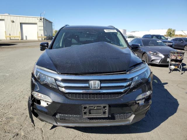 Photo 5 from auction – 2016 HONDA PILOT TOUR with VIN 5FNYF6H90GB077874