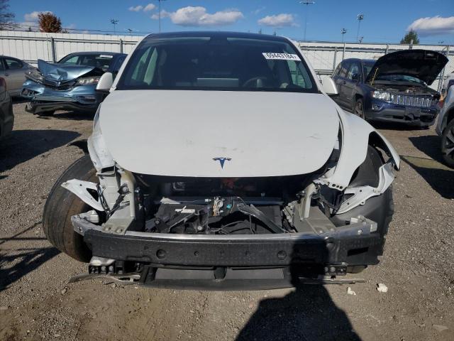 Photo 5 from auction – 2022 TESLA MODEL Y with VIN 7SAYGAEEXNF309334