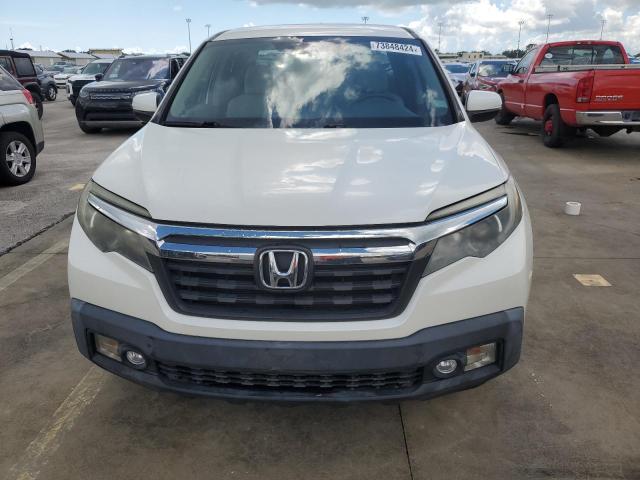 Photo 5 from auction – 2017 HONDA RIDGELINE with VIN 5FPYK2F50HB007210