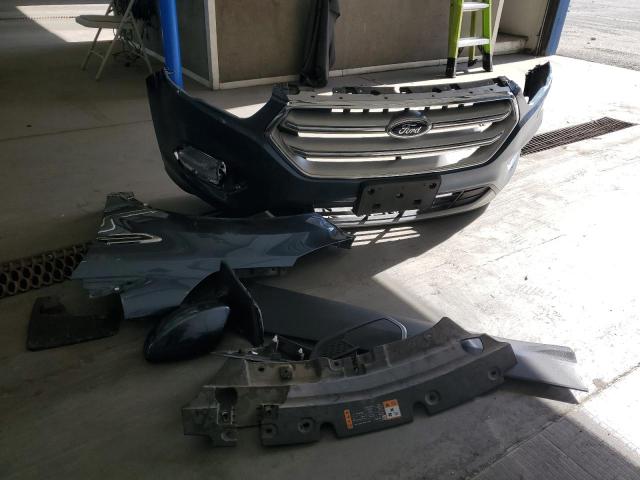 Photo 13 from auction – 2018 FORD ESCAPE SE with VIN 1FMCU9GD9JUC19639