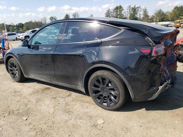 Photo 2 from auction – 2023 TESLA MODEL Y with VIN 7SAYGAEE9PF932592