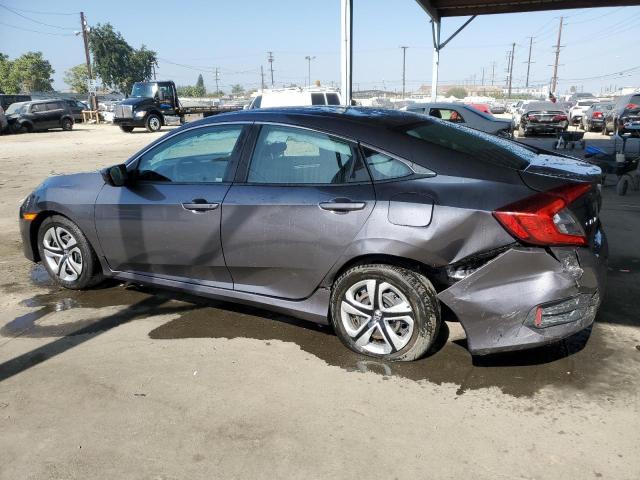 Photo 2 from auction – 2017 HONDA CIVIC LX with VIN 2HGFC2F58HH557876