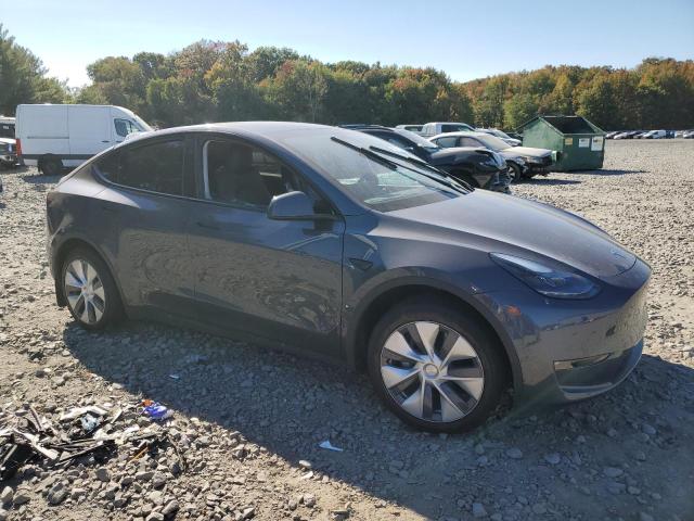 Photo 4 from auction – 2023 TESLA MODEL Y with VIN 7SAYGDEE6PF896023