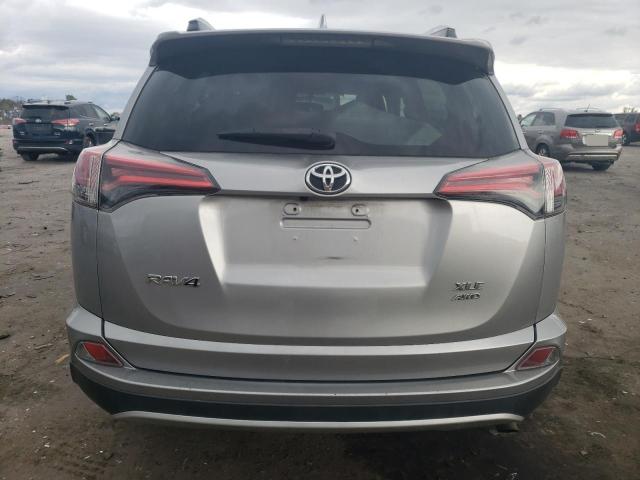 Photo 6 from auction – 2016 TOYOTA RAV4 XLE with VIN 2T3RFREV4GW416802