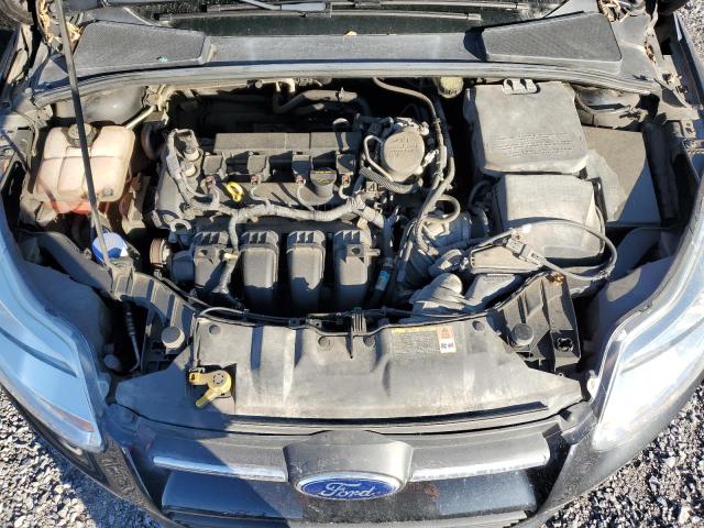 Photo 11 from auction – 2013 FORD FOCUS SE with VIN 1FADP3F27DL356625