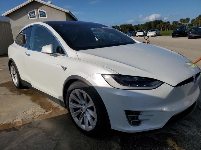 Photo 4 from auction – 2017 TESLA MODEL X with VIN 5YJXCBE23HF063876