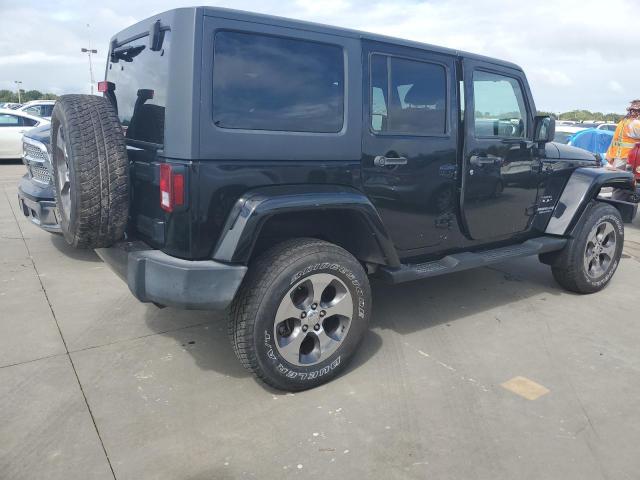 Photo 3 from auction – 2011 JEEP WRANGLER U with VIN 1J4BA5H10BL532618