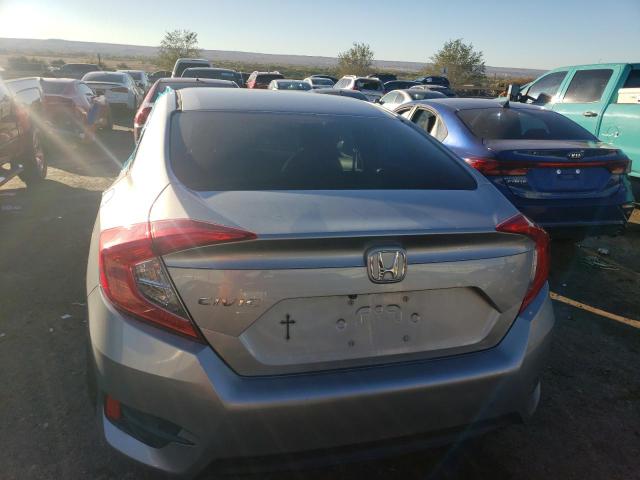Photo 6 from auction – 2018 HONDA CIVIC LX with VIN 19XFC2F54JE019613
