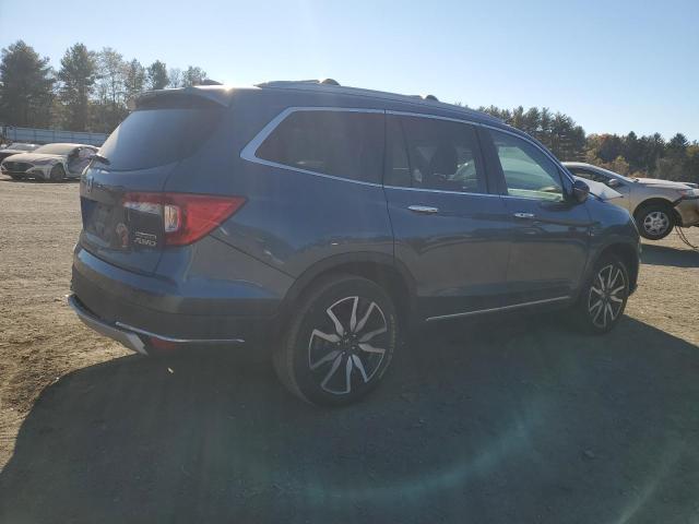 Photo 3 from auction – 2021 HONDA PILOT TOUR with VIN 5FNYF6H60MB024934