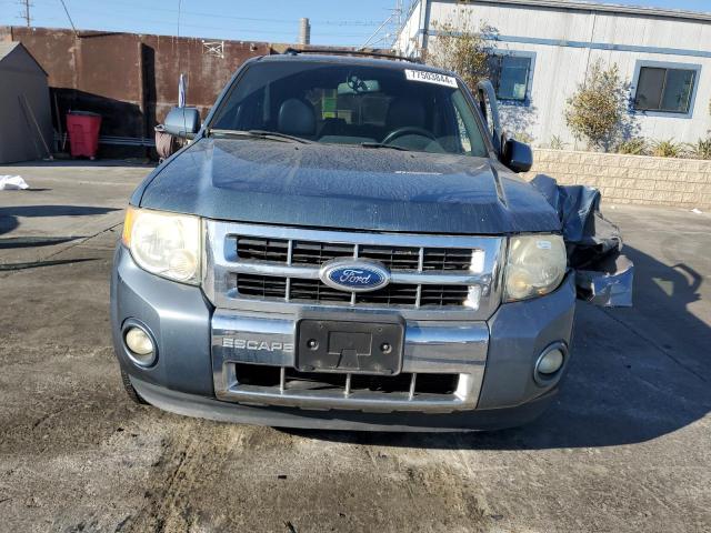 Photo 5 from auction – 2011 FORD ESCAPE LIM with VIN 1FMCU0EG3BKB29652
