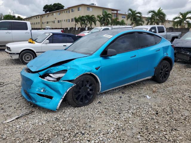 TESLA MODEL Y 2023 with VIN 7SAYGDEE7PA139404 - Photo from auction