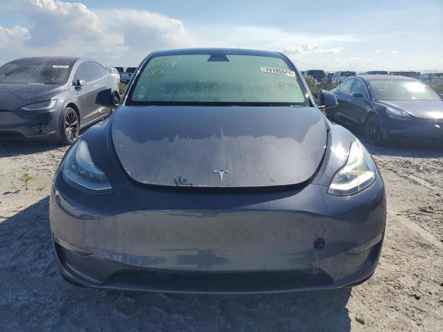 Photo 5 from auction – 2023 TESLA MODEL Y with VIN 7SAYGAEE3PF610563
