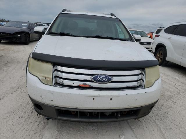 Photo 5 from auction – 2008 FORD TAURUS X S with VIN 1FMDK02W68GA01357