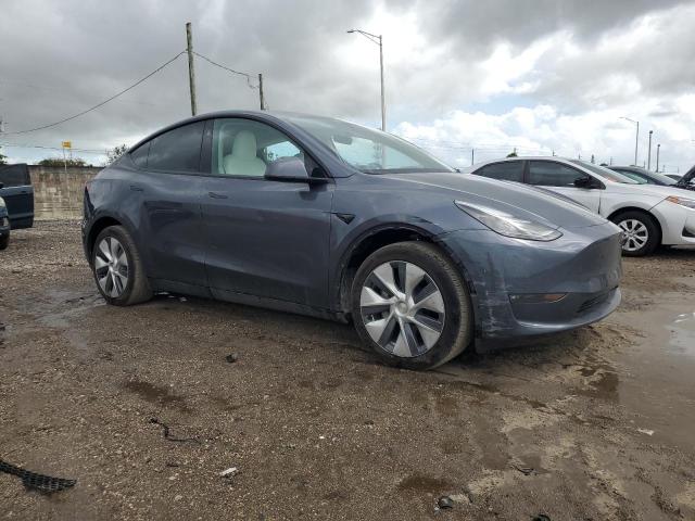 Photo 4 from auction – 2023 TESLA MODEL Y with VIN 7SAYGDEE8PF854503