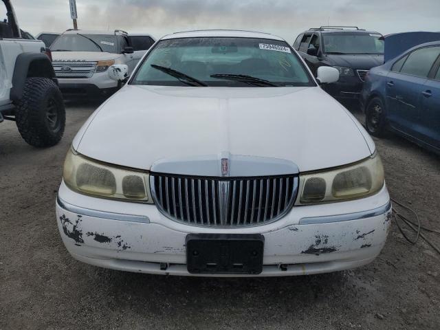 Photo 5 from auction – 1999 LINCOLN TOWN CAR E with VIN 1LNHM81W2XY664767