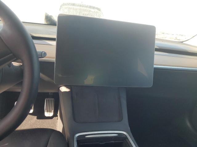 Photo 9 from auction – 2021 TESLA MODEL 3 with VIN 5YJ3E1EA8MF989033