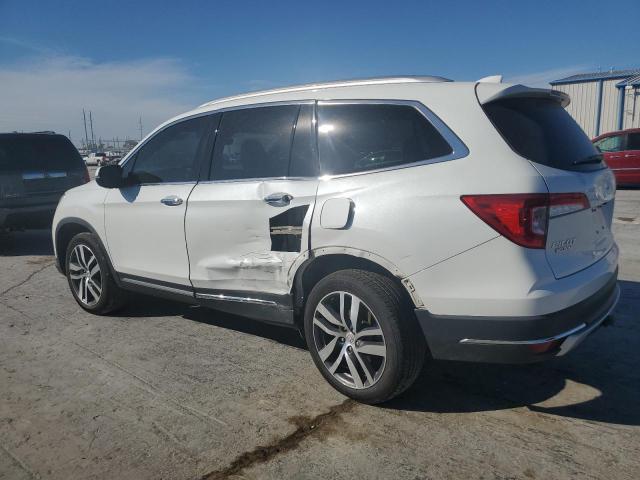 Photo 2 from auction – 2021 HONDA PILOT ELIT with VIN 5FNYF6H00MB047254