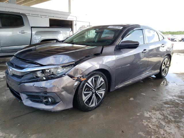 HONDA CIVIC EX 2017 with VIN 19XFC1F3XHE022048 - Photo from auction
