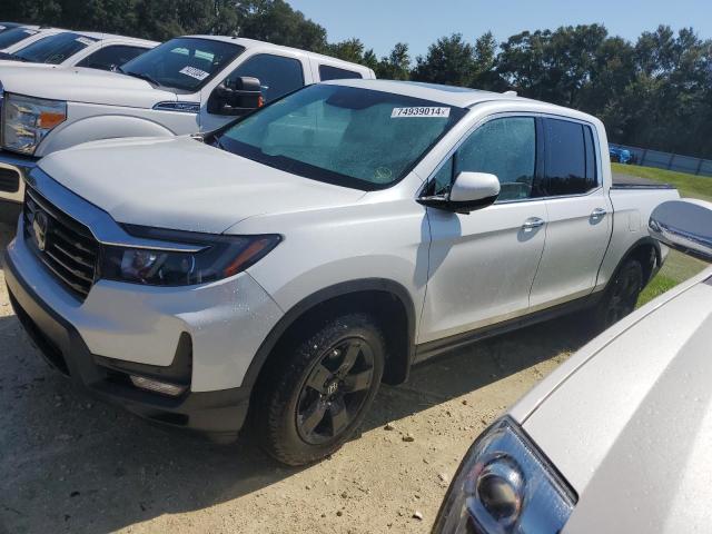 HONDA RIDGELINE 2022 with VIN 5FPYK3F77NB022290 - Photo from auction